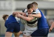 29 January 2017; Ruadhan Byron of Belvedere College is tackled by Rory Simington, left, and Nathan Fitzpatrick-Couxy of St Andrew's College during the Bank of Ireland Leinster Schools Senior Cup Round 1 match between St Andrew’s College and Belvedere College at Donnybrook Stadium in Dublin. Photo by Daire Brennan/Sportsfile
