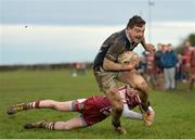29 January 2017; John Doyle of Portlaoise RFC on his way to scoring his side's third try, despite the tackle of Armand Smit of Portarlington RFC during the Bank of Ireland Provincial Towns Cup Round 2 match between Portarlington RFC and Portlaoise RFC at Portarlington RFC in Portarlington, Co Laois. Photo by Seb Daly/Sportsfile