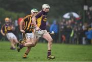29 January 2017; Liam Ryan of Wexford in action against Paddy Deegan of Kilkenny during the Bord na Mona Walsh Cup Semi-Final match between Wexford and Kilkenny at O'Kennedy Park in New Ross, Co Wexford. Photo by Matt Browne/Sportsfile