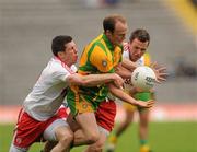 26 June 2011; Colm McFadden, Donegal, in action against Sean Cavanagh and Conor Gormley, Tyrone. Ulster GAA Football Senior Championship Semi-Final, Tyrone v Donegal, St Tiernach's Park, Clones, Co. Monaghan. Picture credit: Oliver McVeigh / SPORTSFILE