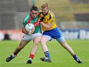 26 June 2011; Shane Hennelly, Mayo, in action against Maurice Connaughton, Roscommon. Connacht GAA Football Minor Championship Semi-Final, Mayo v Roscommon, McHale Park, Castlebar, Co. Mayo. Picture credit: Matt Browne / SPORTSFILE