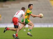 26 June 2011; Michael Hegarty, Donegal, in action against Philip Jordan, Tyrone. Ulster GAA Football Senior Championship Semi-Final, Tyrone v Donegal, St Tiernach's Park, Clones, Co. Monaghan. Picture credit: Oliver McVeigh / SPORTSFILE