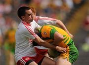 26 June 2011; Ryan McMenamin, Tyrone, in action against Kevin Cassidy, Donegal. Ulster GAA Football Senior Championship Semi-Final, Tyrone v Donegal, St Tiernach's Park, Clones, Co. Monaghan. Picture credit: Oliver McVeigh / SPORTSFILE
