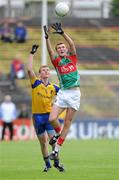26 June 2011; Adam Gallagher, Mayo, in action against Maurice Connaughton, Roscommon. Connacht GAA Football Minor Championship Semi-Final, Mayo v Roscommon, McHale Park, Castlebar, Co. Mayo. Picture credit: Matt Browne / SPORTSFILE