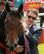 26 June 2011; Winning trainer Aidan O'Brien after he sent out Treasure Beach to win the Dubai Duty Free Irish Derby (Group 1). Horse Racing, The Curragh Racecourse, Co. Kildare. Picture credit: Pat Murphy / SPORTSFILE