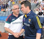 26 June 2011; Carlow manager Luke Dempsey shakes hands with his Wexford counterpart Jason Ryan after the game. Leinster GAA Football Senior Championship Semi-Final, Wexford v Carlow, Croke Park, Dublin. Picture credit: Dáire Brennan / SPORTSFILE