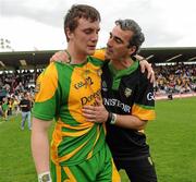 26 June 2011; Donegal manager Jim McGuinness celebrates with Leo McLoone after the game. Ulster GAA Football Senior Championship Semi-Final, Tyrone v Donegal, St Tiernach's Park, Clones, Co. Monaghan. Picture credit: Oliver McVeigh / SPORTSFILE