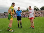 26 June 2011; Referee Joe McQuillan along with Donegal, captain Michael Murphy, left, and Tyrone captain Brian Dooher. Ulster GAA Football Senior Championship Semi-Final, Tyrone v Donegal, St Tiernach's Park, Clones, Co. Monaghan. Picture credit: Oliver McVeigh / SPORTSFILE
