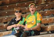 26 June 2011; Donegal supporters cheer on their side in the stand. Ulster GAA Football Senior Championship Semi-Final, Tyrone v Donegal, St Tiernach's Park, Clones, Co. Monaghan. Picture credit: Oliver McVeigh / SPORTSFILE