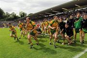 26 June 2011; The Donegal squad take to the field after having the traditional team photograph taken. Ulster GAA Football Senior Championship Semi-Final, Tyrone v Donegal, St Tiernach's Park, Clones, Co. Monaghan. Picture credit: Oliver McVeigh / SPORTSFILE