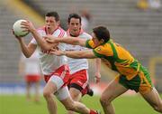 26 June 2011; Sean Cavanagh, Tyrone, in action against Ryan Bradley, Donegal. Ulster GAA Football Senior Championship Semi-Final, Tyrone v Donegal, St Tiernach's Park, Clones, Co. Monaghan. Picture credit: Oliver McVeigh / SPORTSFILE
