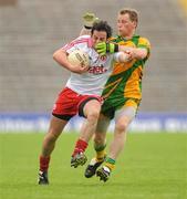 26 June 2011; Davy Harte, Tyrone, in action against Anthony Thompson, Donegal. Ulster GAA Football Senior Championship Semi-Final, Tyrone v Donegal, St Tiernach's Park, Clones, Co. Monaghan. Picture credit: Oliver McVeigh / SPORTSFILE