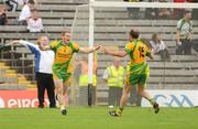 26 June 2011; Dermot Molloy, Donegal, left, celebrates with Colm McFadden after scoring his side's second goal. Ulster GAA Football Senior Championship Semi-Final, Tyrone v Donegal, St Tiernach's Park, Clones, Co. Monaghan. Picture credit: Oliver McVeigh / SPORTSFILE