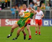 26 June 2011; Kevin Cassidy, Donegal, in action against  Kevin Hughes, Tyrone. Ulster GAA Football Senior Championship Semi-Final, Tyrone v Donegal, St Tiernach's Park, Clones, Co. Monaghan. Picture credit: Michael Cullen / SPORTSFILE