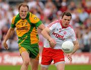26 June 2011; Conor Gormley, Tyrone, in action against Colm McFadden, Donegal. Ulster GAA Football Senior Championship Semi-Final, Tyrone v Donegal, St Tiernach's Park, Clones, Co. Monaghan. Picture credit: Michael Cullen / SPORTSFILE