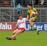 26 June 2011; Michael Hegarty, Donegal, in action against Peter Harte, Tyrone. Ulster GAA Football Senior Championship Semi-Final, Tyrone v Donegal, St Tiernach's Park, Clones, Co. Monaghan. Picture credit: Michael Cullen / SPORTSFILE