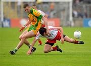 26 June 2011; Davey Harte, Tyrone, in action against Kevin Rafferty, Donegal. Ulster GAA Football Senior Championship Semi-Final, Tyrone v Donegal, St Tiernach's Park, Clones, Co. Monaghan. Picture credit: Michael Cullen / SPORTSFILE