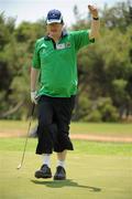 27 June 2011; Team Ireland golfer Michael O'Leary, Killarney, Co. Kerry, celebrates sinking a par putt on the 16th green during the qualifying rounds at the Glyfada Golf Course. 2011 Special Olympics World Summer Games, Athens, Greece. Picture credit: Ray McManus / SPORTSFILE