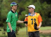 27 June 2011; Team Ireland's Gary Fleming, Monkstown, Co. Cork, and his caddy Donal Deady, Bruree, Co. Limerick, on the 17th tee box during the qualifying rounds at the Glyfada Golf Course. 2011 Special Olympics World Summer Games, Athens, Greece. Picture credit: Ray McManus / SPORTSFILE