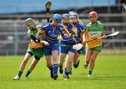 18 June 2011; Geraldine Stapleton, right, Tipperary, in action against Linda Sullivan, Offaly. All-Ireland Senior Camogie Championship, Round 2, in association with RTE Sport, Tipperary v Offaly, Semple Stadium, Thurles, Co. Tipperary. Picture credit: Barry Cregg / SPORTSFILE
