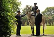 27 June 2011; Garda Commissioner Martin Callinan, left, with Joe Walsh, Chairman, Horse Sport Ireland and Garda Lisa Halligan, Mounted Unit, pictured at the Hand-over of Embarr, sponsored by HSI to the Garda Mounted Unit. Garda Mounted Unit, Phoenix Park, Dublin. Picture credit: David Maher / SPORTSFILE