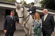 27 June 2011; Garda Commissioner Martin Callinan, left, with Joe Walsh, Chairman, Horse Sport Ireland and Garda Lisa Halligan, Mounted Unit, and Deirdre Orme, winner of the competition to name the horse, pictured at the Hand-over of Embarr, sponsored by HSI to the Garda Mounted Unit. Garda Mounted Unit, Phoenix Park, Dublin. Picture credit: David Maher / SPORTSFILE