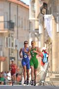 25 June 2011; Ireland's Aileen Morrison, from Derry, followed by Hollie Avil, Great Britain, in action during the Elite Women's race. 2011 Pontevedra ETU Triathlon European Championships - Elite Women, Pontevedra, Spain. Picture credit: Stephen McCarthy / SPORTSFILE