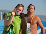 27 June 2011; Team Ireland's Peter Oxley, Tyrrelspass, Co. Westmeath, who won a Bronze Medal in a 100m Backstroke Final with Egypt's Ramy Hussein Elkady, who finished 5th, the OAKA Olympic Aquatic Center, Athens Olympic Sport Complex. 2011 Special Olympics World Summer Games, Athens, Greece. Picture credit: Ray McManus / SPORTSFILE