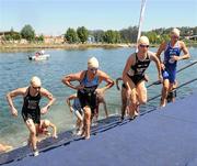 25 June 2011; Competitors, from left, Elizabeth May, Luxembourg, Mateja Simic, Slovenia, Sarah Fladung, Germany, and Hollie Avil, Great Britain, in action during the Elite Women's race. 2011 Pontevedra ETU Triathlon European Championships - Elite Women, Pontevedra, Spain. Picture credit: Stephen McCarthy / SPORTSFILE