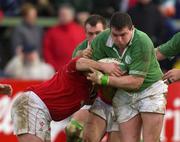 2 February 2002; Reggie Corrigan of Ireland A is tackled by Mefin Davies of Wales A during the &quot;A&quot; Rugby International match between Ireland A and Wales A at Musgrave Park in Cork. Photo by Brendan Moran/Sportsfile