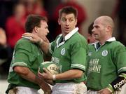 2 February 2002; John Kelly of Ireland A, left, is congratulated  by team-mates Tyrone Howe and Paul Burke after scoring a try during the &quot;A&quot; Rugby International match between Ireland A and Wales A at Musgrave Park in Cork. Photo by Brendan Moran/Sportsfile