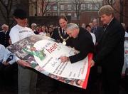 7 February 2002; Fancy being a volunteer at the biggest sporting event in the world next year? Now is your chance. The 2003 Special Olympics World Games today launched the country's largest ever volunteer appeal when it asked for 30,000 people to work at next year's World Games. In attendance at the announcement with An Taoiseach Bertie Ahern,T.D., who was the first to sign, are, from left, Brody Sweeney, Chief Executive, O'Briens Irish Sandwich Bars, The Lord Mayor of Dublin, Michael Mulchay and Denis O'Brien, Chairman, 2003 Special Olympics World Games Organising Committee. Photo by Ray McManus/Sportsfile