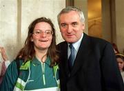 7 February 2002; Fancy being a volunteer at the biggest sporting event in the world next year? Now is your chance. The 2003 Special Olympics World Games today launched the country's largest ever volunteer appeal when it asked for 30,000 people to work at next year's World Games. Pictured at the announcement with An Taoiseach Bertie Ahern,T.D., who was the first to sign, is Special Olympian Finola Brady, from Navan, Meath. Photo by Ray McManus/Sportsfile