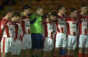 8 February 2002; Members of the Sligo Rovers team stand for a minutes silence ahead of the FAI Carlsberg Cup Quarter-Final match between Shamrock Rovers and Sligo Rovers at Tolka Park in Dublin. Photo by Damien Eagers/Sportsfile