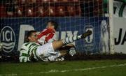 8 February 2002; Billy Woods of Shamrock Rovers slides in to score his side's first goal during the FAI Carlsberg Cup Quarter-Final match between Shamrock Rovers and Sligo Rovers at Tolka Park in Dublin. Photo by Damien Eagers/Sportsfile