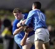9 February 2002; James Norton of St Mary's College is tackled by Billy Treacy of Garryowen during the AIB All-Ireland League match between Garryowen and St Mary's College at Dooradoyle in Limerick. Photo by Brendan Moran/Sportsfile