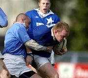 9 February 2002; Peter Coyle of St Mary's Collge tackled by Ray Niland of Garryowen during the AIB All-Ireland League match between Garryowen and St Mary's College at Dooradoyle in Limerick. Photo by Brendan Moran/Sportsfile