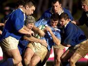 9 February 2002; Colin Varley of Garryowen is tackled by the St Mary's College players during the AIB All-Ireland League match between Garryowen and St Mary's College at Dooradoyle in Limerick. Photo by Brendan Moran/Sportsfile