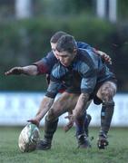 9 February 2002;  Derek Hegarty of Shannon, is tackled by Mike Walls of Clontarf during the AIB All-Ireland League Division 1 match between Clontarf and Shannon at Castle Avenue in Clontarf, Dublin. Photo by Aoife Rice/Sportsfile