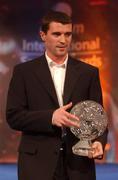10 February 2002; Roy Keane, the eircom Senior Player of the Year, with his award in attendance at the eircom International Soccer Awards at Citywest Hotel in Saggart, Dublin. Photo by David Maher/Sportsfile