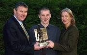 11 February 2002; Carlow footballer Bryan Carbery, centre, is presented with his eircell Vodafone GAA Player of the Month award for January by Sean McCague, President of the GAA, and Karen Chew, eircell Vodafone's regional corporate relations manager, at the Dolmen Hotel in Carlow. Photo by Damien Eagers/Sportsfile