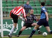 10 February 2002; Sean Hargan of Derry City, shoots past UCD goalkeeper Barry Ryan to score his sides equalizing goal during the FAI Carlsberg Cup Quarter-Final match between UCD and Derry City at Belfield Park in Dublin. Photo by David Maher/Sportsfile