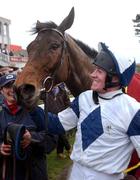10 February 2002; Barry Geraghty celebrates his win on Alexander Banquet in the Hennessy Cognac Gold Cup during Horse Racing from Leopardstown Racecourse in Dublin. Photo by Matt Browne/Sportsfile