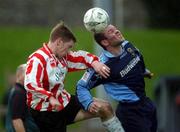 10 February 2002; Eamon Doherty of Derry City, in action against David Quinn of UCD during the FAI Carlsberg Cup Quarter-Final match between UCD and Derry City at Belfield Park in Dublin. Photo by David Maher/Sportsfile