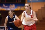 11 February 2002; Kelly Johnston of St. Catherine's in action against Grace Howard of Cabinteely during the Bank of Ireland Schools Cup U16 &quot;C&quot; Girls Final match between Cabinteely Community School, Dublin, and St Catherine's Vocational school, Killybegs, Donegal, at the ESB Arena in Tallaght, Dublin. Photo by Brendan Moran/Sportsfile