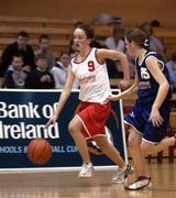 11 February 2002; Niamh McKenna of St Catherine's in action against Sam Egan of Cabinteely during the Bank of Ireland Schools Cup U16 &quot;C&quot; Girls Final match between Cabinteely Community School, Dublin, and St Catherine's Vocational school, Killybegs, Donegal, at the ESB Arena in Tallaght, Dublin. Photo by Brendan Moran/Sportsfile