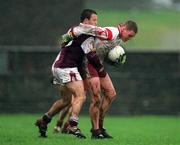 10 February 2002; Cormac McAnallen of Tyrone in action against Derek Savage of Galway during the Allianz National Football League Division 1A Round 1 match between Galway and Tyrone at Duggan Park in Ballinasloe, Galway. Photo by Damien Eagers/Sportsfile