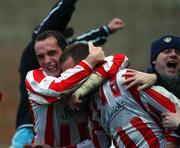 10 February 2002; Eamon Doherty of Derry City celebrates with goalscorer Liam Coyle at the end of the game following the FAI Carlsberg Cup Quarter-Final match between UCD and Derry City at Belfield Park in Dublin. Photo by David Maher/Sportsfile