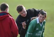 12 February 2002; A young Irish rugby fan gets his shirt signed by Brian O'Driscoll after an Ireland Rugby Squad Training Session at Dr. Hickey Park in Greystones, Wicklow. Photo by Matt Browne/Sportsfile