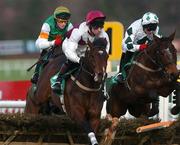 10 February 2002; Cashel Bay, with Martin Mooney up, centre, jumps the last with Lucky Achievement, with Shay Barry up, right, and Amandas Princess, with Alan Donaghue up, during the Cashmans Bookmakers Juvenile Hurdle during Horse Racing from Leopardstown Racecourse in Dublin. Photo by Matt Browne/Sportsfile